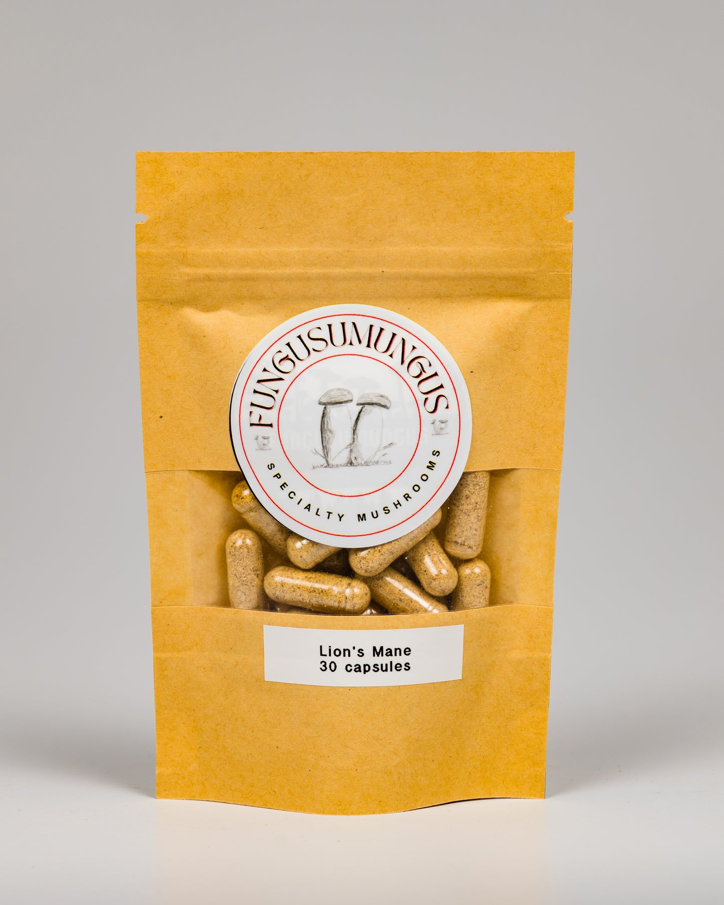 A package of Lion's Mane capsules with 30 capsules inside, each capsule having 700 mg. The package is labeled with the brand Fungusumungus and has a gross weight of 21 grams.
